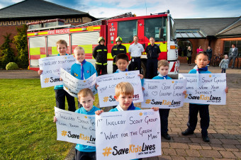 Members of the 1st Ingleby Barwick Scout Group proudly display their road safety posters following a visit from Cleveland Fire Brigade