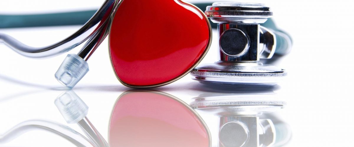 A red heart badge between a stethoscope which is facing down