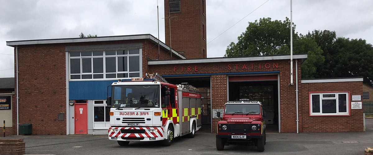 Outside of Guisborough Fire Station with a fire engine and other vehicle