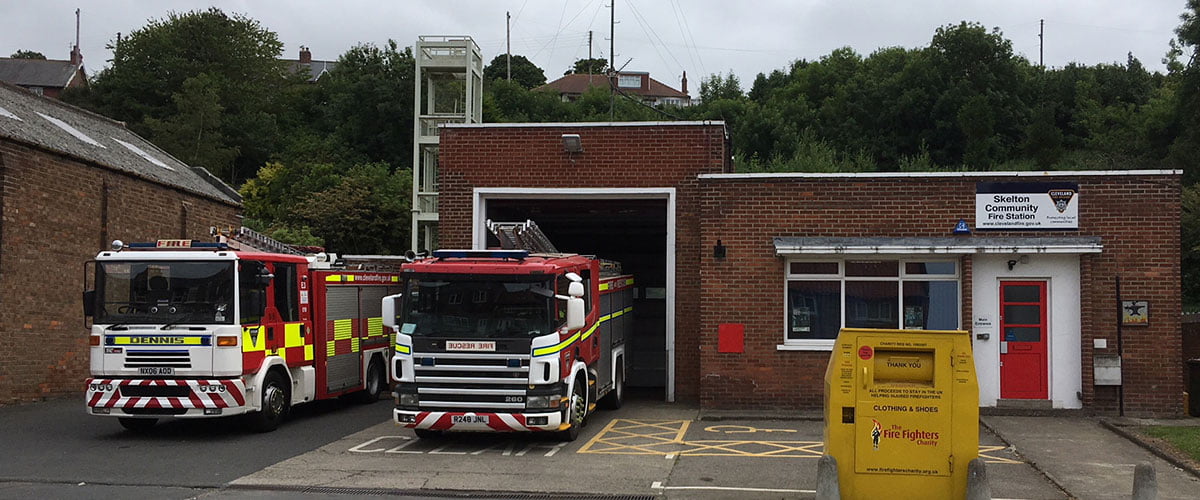 Outside of skelton community fire station with fire engines