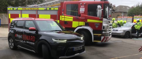 project edward kia car, fire engine and a road traffic collision demonstration in the back