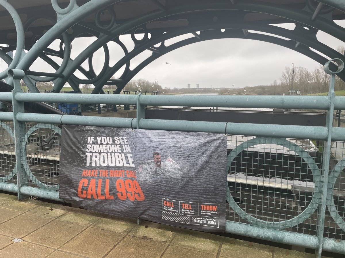An image of a bridge with a drowning prevention banner on it