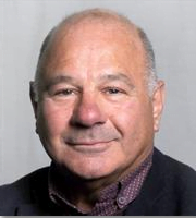 headshot of a male in a suit