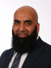 headshot of a male in a suit