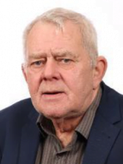 headshot of a male in a suit