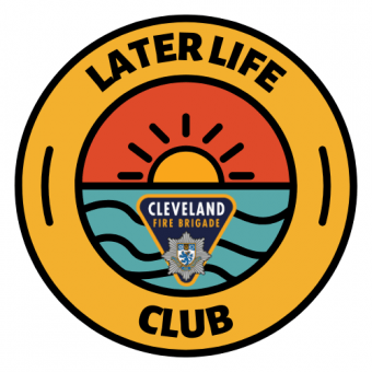 A yellow logo which shows the sun and the sea and the words Later Life Club