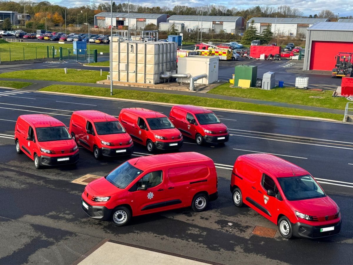 An aerial view shot of the new six electric vehicles which have been added to the Brigade fleet. There are two which are cherry red and four which are vermillion red to celebrate the old livery.