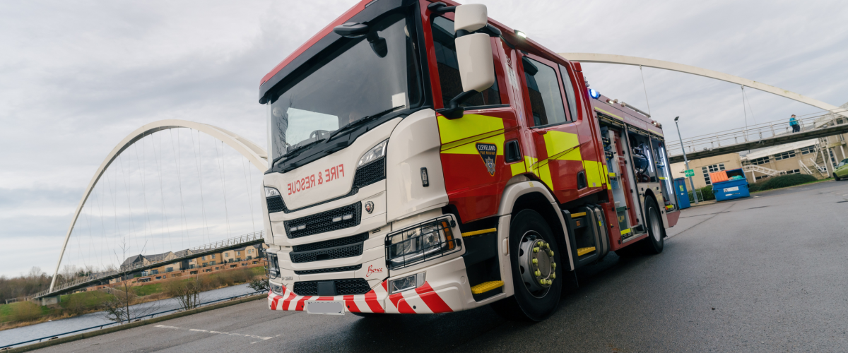 One of Cleveland Fire Brigade's fire engines in front of the Infinity bridge in Stockton.